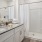 a bathroom with a marble countertop