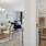 a dining room with a table and chairs
